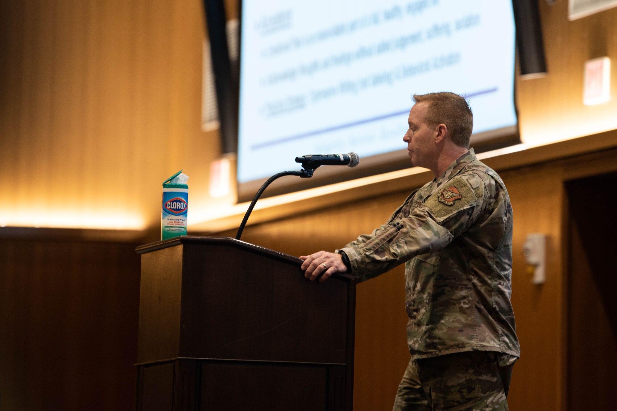 Lt. Col. Joel Foster, a licensed psychologist and director of operations from the 18th Wing Operational Medical Readiness Squadron, speaks to Airmen during an all-call at Kadena Air Base, Japan, Jan 7, 2021.  The all-call discussed resiliency, COVID, and pressing issues concerning the base. (U.S. Air Force Photo by Airman 1st Class Stephen Pulter)