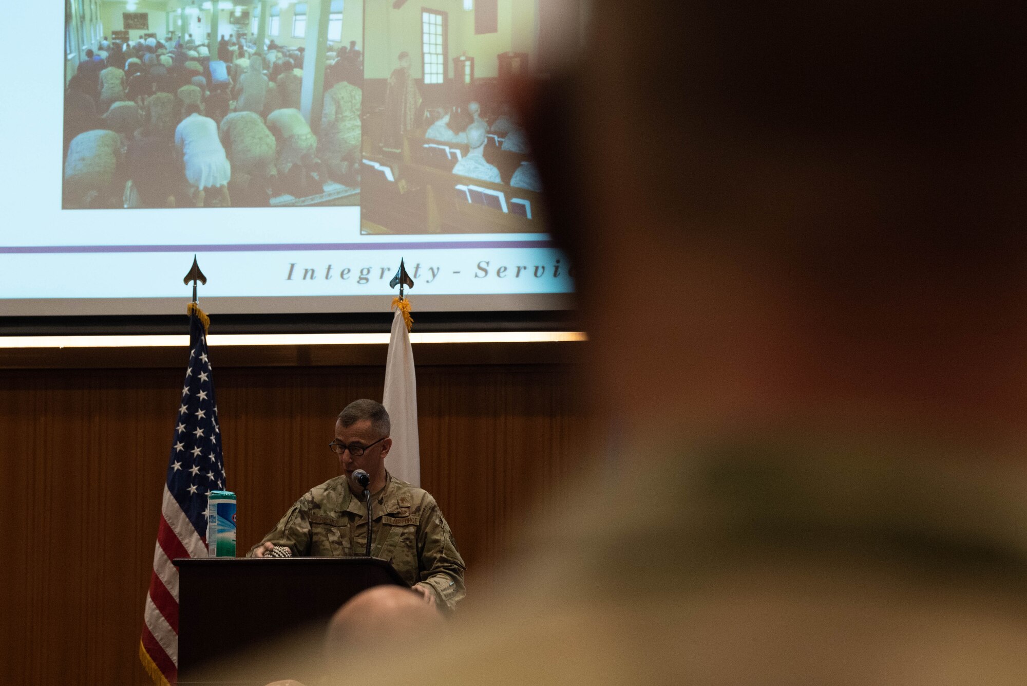 Col. Peter Fischer, the 18th Wing chaplain, speaks to Airmen during an all-call at Kadena Air Base, Japan, Jan 7, 2021.  The all-call discussed resiliency, COVID, and pressing issues concerning the base. (U.S. Air Force Photo by Airman 1st Class Stephen Pulter)