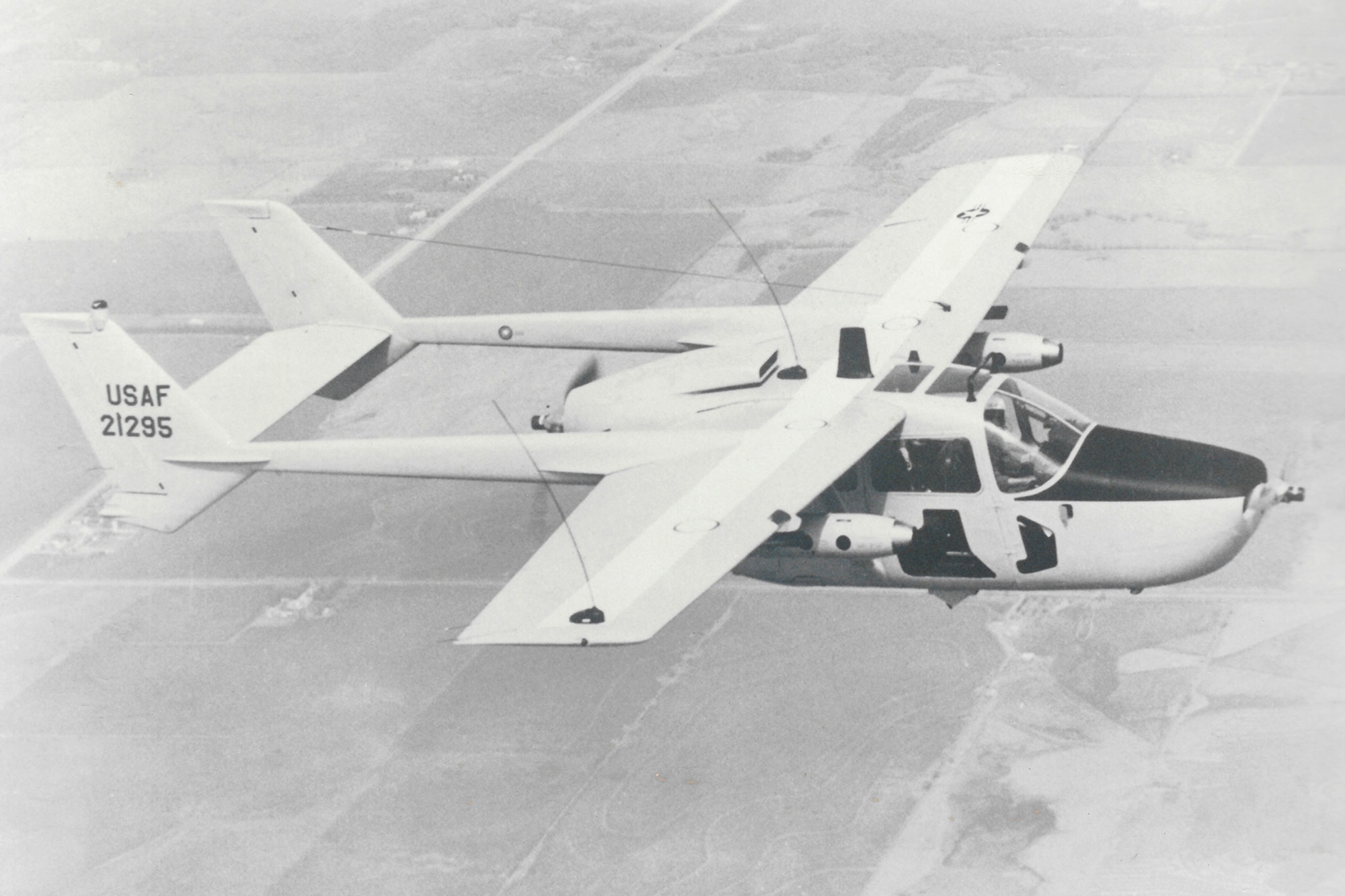 Caption:  An O-2 Skymaster flies a training sortie above Indiana in 1971.  The O-2 Skymaster was a special operations forward air controller observation aircraft stationed at Grissom Air Force Base Ind., after the 434th Tactical Airlift Wing was reestablished as a special operations unit at Grissom Air Force Base on Jan. 15, 1971.  (U.S. Air Force 434th ARW History Office Courtesy Photo)
