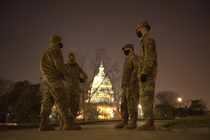 Virginia Army National Guard Soldiers assigned to Bravo Troop, 2nd Squadron, 183rd Cavalry Regiment, 116th Infantry Brigade Combat Team, stand guard Jan. 11, 2021, in Washington, D.C. National Guard Soldiers and Airmen from multiple states have traveled to Washington to support to federal and district authorities leading up to the 59th presidential inauguration.