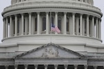 Approximately 100 Vermont National Guardsmen will deploy to Washington, D.C., to support inauguration efforts the week of Jan. 18, 2021. In this photo, the American flag flies at half-staff over the U.S. Capitol Jan. 11 in honor of Capitol Police Officer Brian Sicknick, who was killed during the riot Jan. 6.