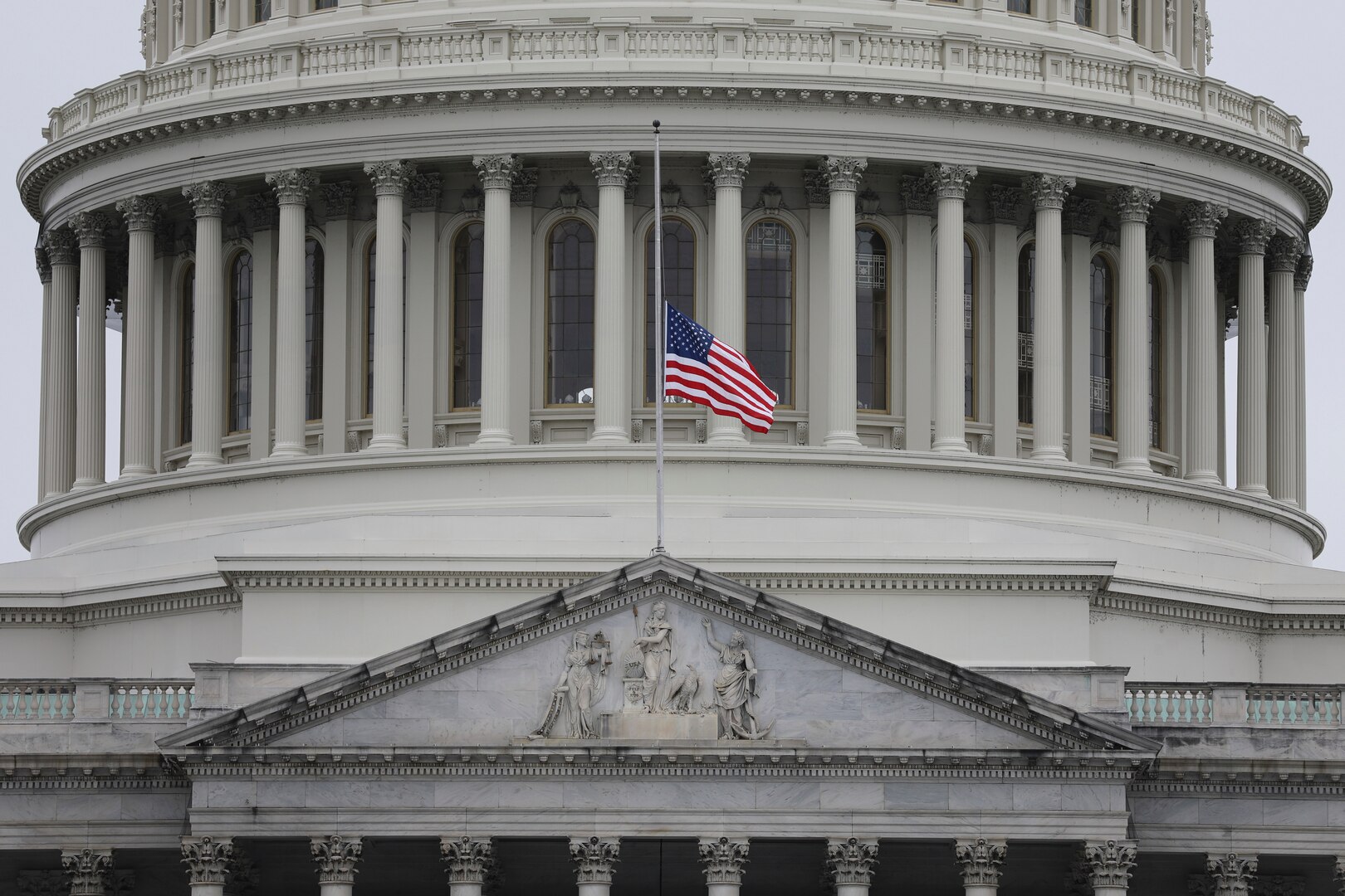 Approximately 100 Vermont National Guardsmen will deploy to Washington, D.C., to support inauguration efforts the week of Jan. 18, 2021. In this photo, the American flag flies at half-staff over the U.S. Capitol Jan. 11 in honor of Capitol Police Officer Brian Sicknick, who was killed during the riot Jan. 6.