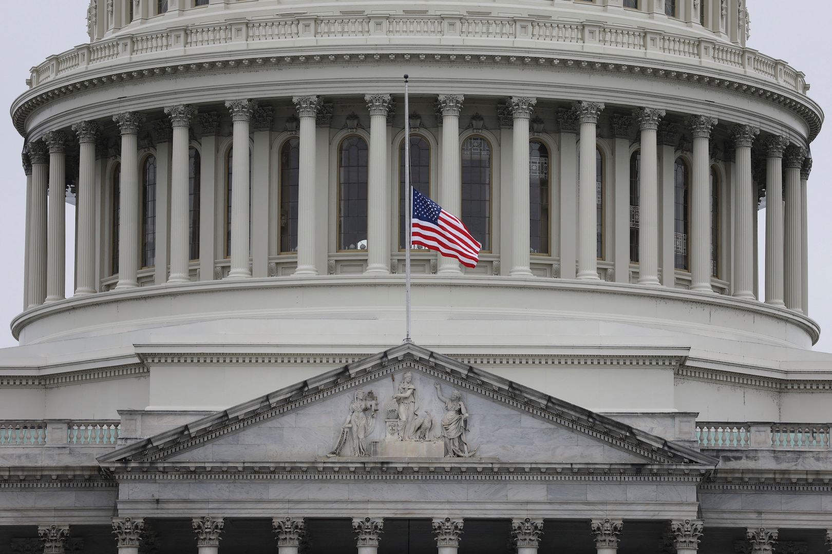 Approximately 100 Vermont National Guardsmen will deploy to Washington, D.C., to support inauguration efforts the week of Jan. 18, 2021. In this photo, the American flag flies at half-staff over the U.S. Capitol Jan. 11 in honor of Capitol Police Officer Brian Sicknick, who was killed during the riot Jan. 6.