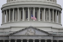 Approximately 100 Vermont National Guardsmen will deploy to Washington, D.C., to support inauguration efforts the week of Jan. 18, 2021. In this photo, the American flag flies at half-staff over the U.S. Capitol Jan. 11 in honor of Capitol Police Officer Brian Sicknick, who was killed during the riot Jan. 6.