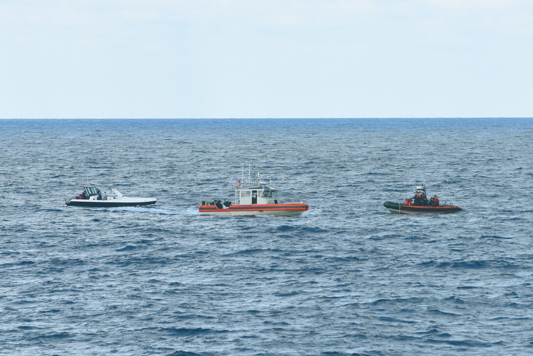 Two small boat teams from the USCGC Stone (WMSL 758) intercept a vessel on the Caribbean Sea that they suspect of engaging in illegal activity on Jan. 6, 2021.