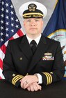 Studio portrait of Cmdr. Paul Cassutti