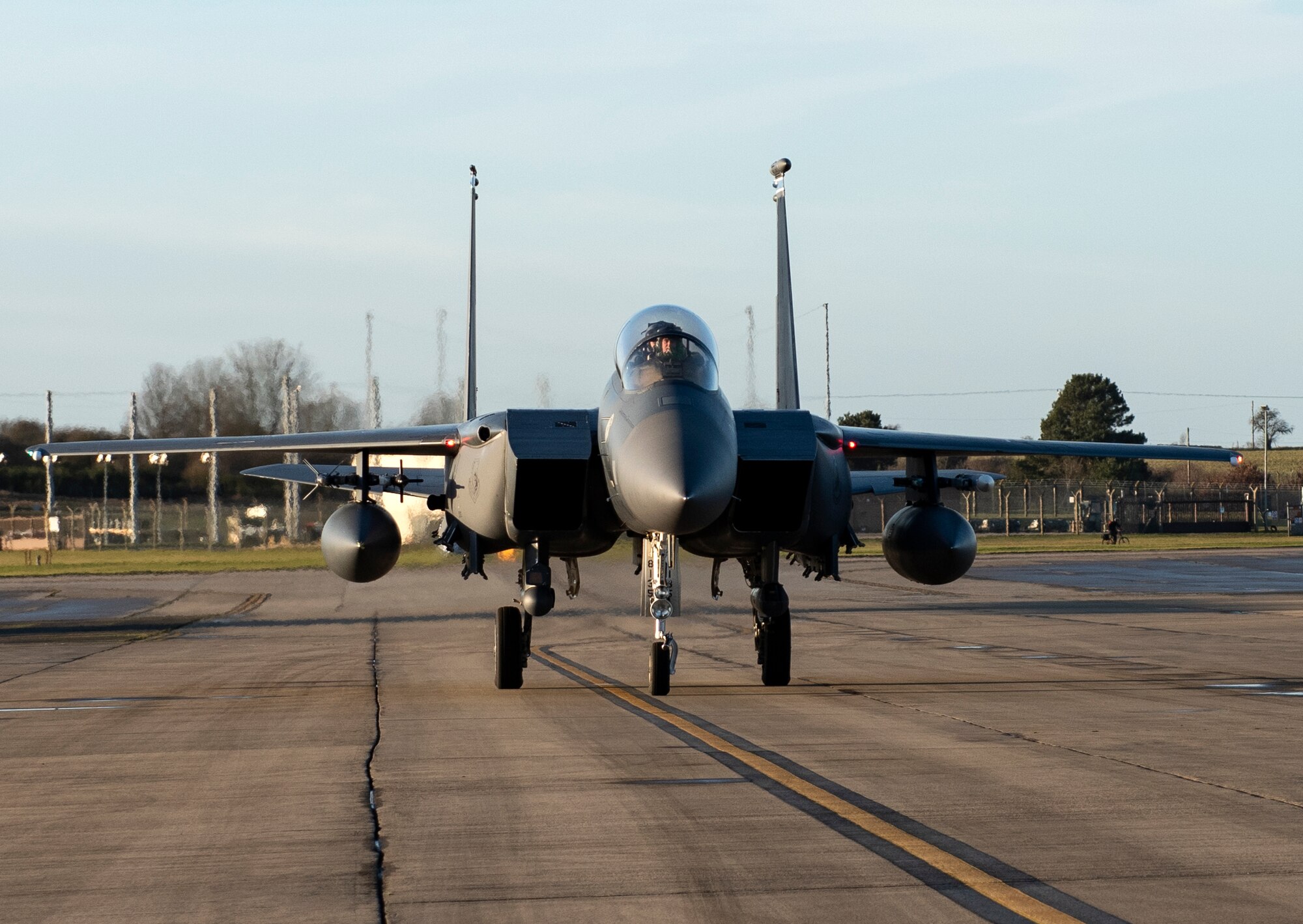 An F-15E Strike Eagle assigned to the 492nd Fighter Squadron returns from a sortie during Agile Combat Employment training at Royal Air Force Lakenheath, England, Jan. 12, 2021. Training incorporating ACE concepts contribute to the development of multi-capable Airmen and aircrew, improving interoperability and helping allies and partners increase their capabilities in less than optimal environments. (U.S. Air Force photo by Airman 1st Class Jessi Monte)