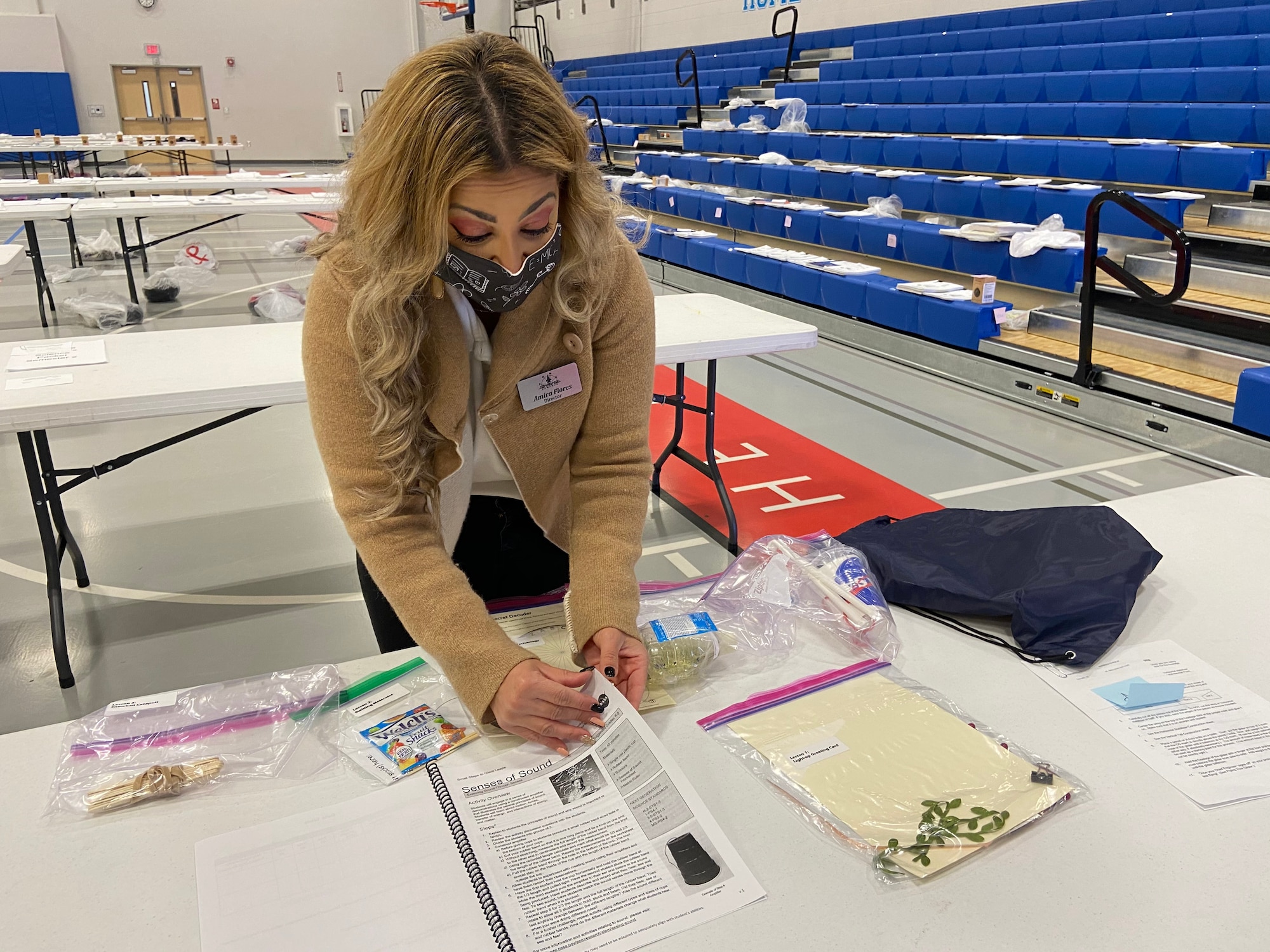 Amira Flores, STARBASE Edwards Director, displays the contents of a STEM (Science, Technology, Engineering and Math) kit at Palmdale Aerospace Academy in Palmdale, California, Jan. 14. The lesson kits were assembled by STARBASE Edwards and the Museum of Arts and History (MOAH-Lancaster) while the Lockheed Martin Corporation donated the grant to purchase supplies for 1,500 STEM kits to community youths in Title 1 schools in Palmdale and Lancaster. (Air Force photo by Grady Fontana)