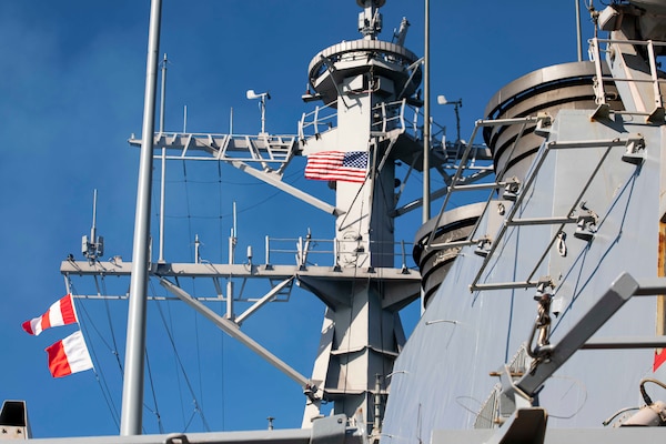 210112-N-BM428-0010 ROTA, Spain (Jan. 12, 2021) The Ensign is flown from the mast of the Arleigh Burke-class guided-missile destroyer USS Porter (DDG 78) after getting underway from Rota, Spain, Jan. 12, 2021. Porter, forward deployed to Rota, Spain, is on its ninth patrol in the U.S. 6th fleet area of operations in support of U.S. national security interests in Europe and Africa.