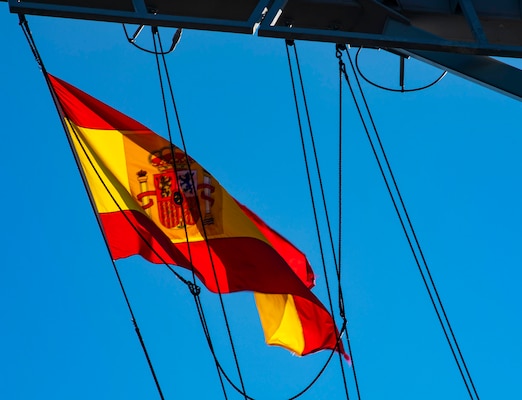 210112-N-BM428-0001 ROTA, Spain (Jan. 12, 2021) The Flag of Spain flies aboard the Arleigh Burke-class guided-missile destroyer USS Porter (DDG 78) while the ship departs from Rota, Spain for its ninth Forward-Deployed Naval Forces-Europe (FDNF-E) patrol, Jan. 12, 2021. Porter, forward deployed to Rota, Spain, is on its ninth patrol in the U.S. 6th fleet area of operations in support of U.S. national security interests in Europe and Africa.
