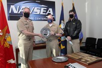 Rear Admiral Eric Ver Hage, Navy Regional Maintenance Center (CNRMC) and Director, Surface Ship Maintenance and Modernization (SEA 21) presented the Rear Admiral "Deak" Parsons award to Capt. Thomas Dickinsson and CMDR Tyson Young in a ceremony at the Washington Navy Yard.