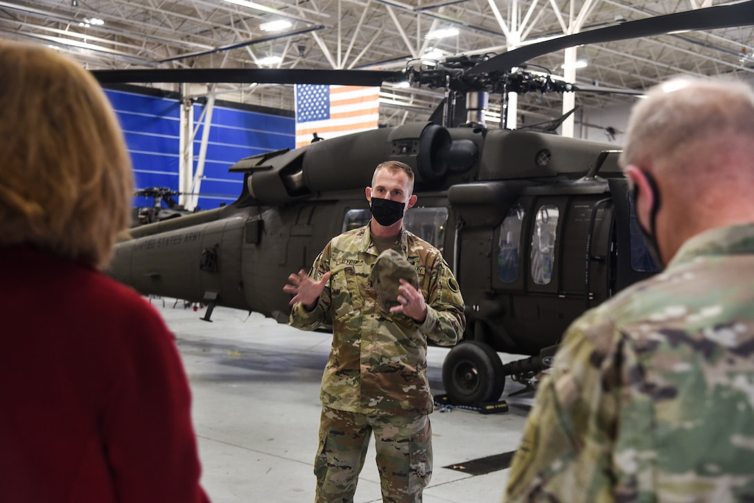 Virginia Deputy Secretary of Veterans and Defense Affairs Kathleen Jabs tours the Virginia National Guard’s Army Aviation Support Facility alongside Maj. Gen. Timothy P. Williams, the Adjutant General of Virginia, Dec. 11, 2020, near the Richmond International Airport. The tour served to better familiarize the deputy secretary with the capabilities of the VNG’s aviation assets, the support capabilities of the AASF, and the initiative to build a new facility.