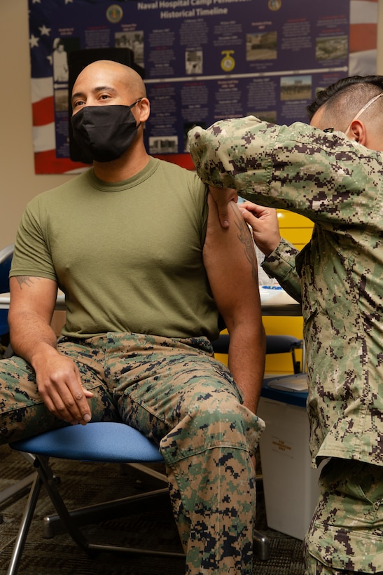 U.S. Marine Corps Brig. Gen. Bobbi Shea, commanding general, 1st Marine Logistics Group, along with other members of the 1st MLG command team, receive the COVID-19 vaccine at the naval hospital on Marine Corps Base Camp Pendleton, California, Jan. 13, 2021. While the COVID-19 vaccine is voluntary, all eligible Marine Corps personnel and beneficiaries are highly encouraged to be vaccinated to protect their health and their community. “I got my vaccine today because, along with wearing a mask, washing your hands, and social distancing, receiving the vaccine when available adds another layer of protection to ensure 1st MLG is ready, trained and capable, in service to our Nation” said Brig. Gen. Bobbi Shea.