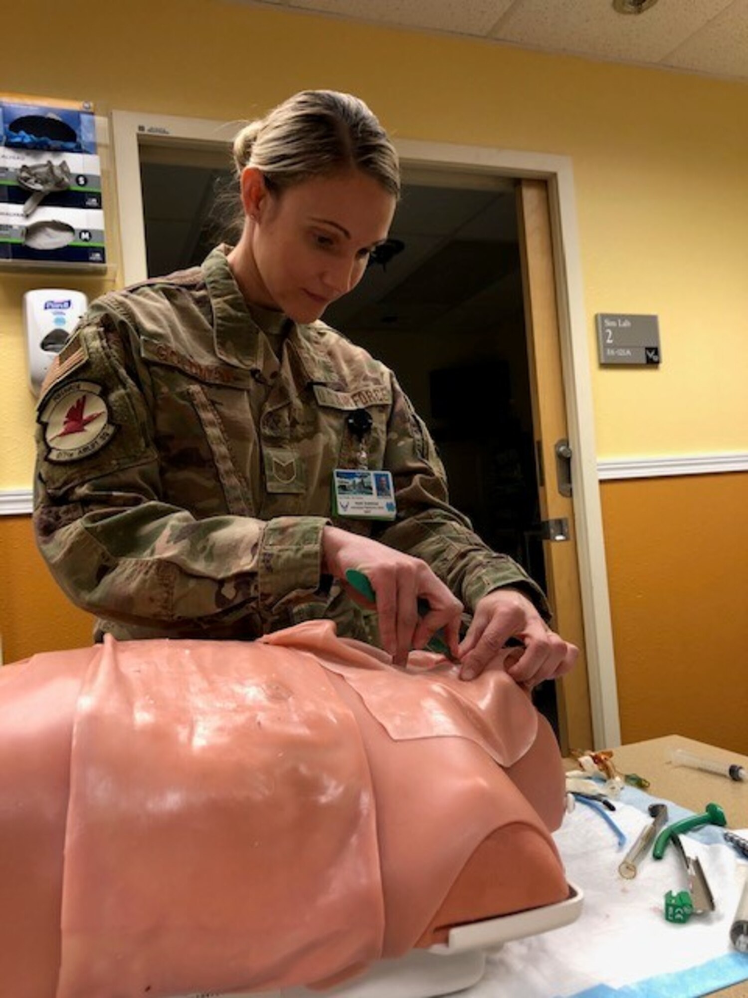 Air Force Tech. Sgt. Heidi Goldman, 90th Fighter Squadron independent duty medical technician, performs a simulated cricothyroidoctomy as part of her annual sustainment and emergency medicine procedure skills, Oct. 31, 2020 at Joint Base Elmendorf-Richardson, Alaska. IDMTs are required at minimal to perform and demonstrate emergency airway skills once a year.