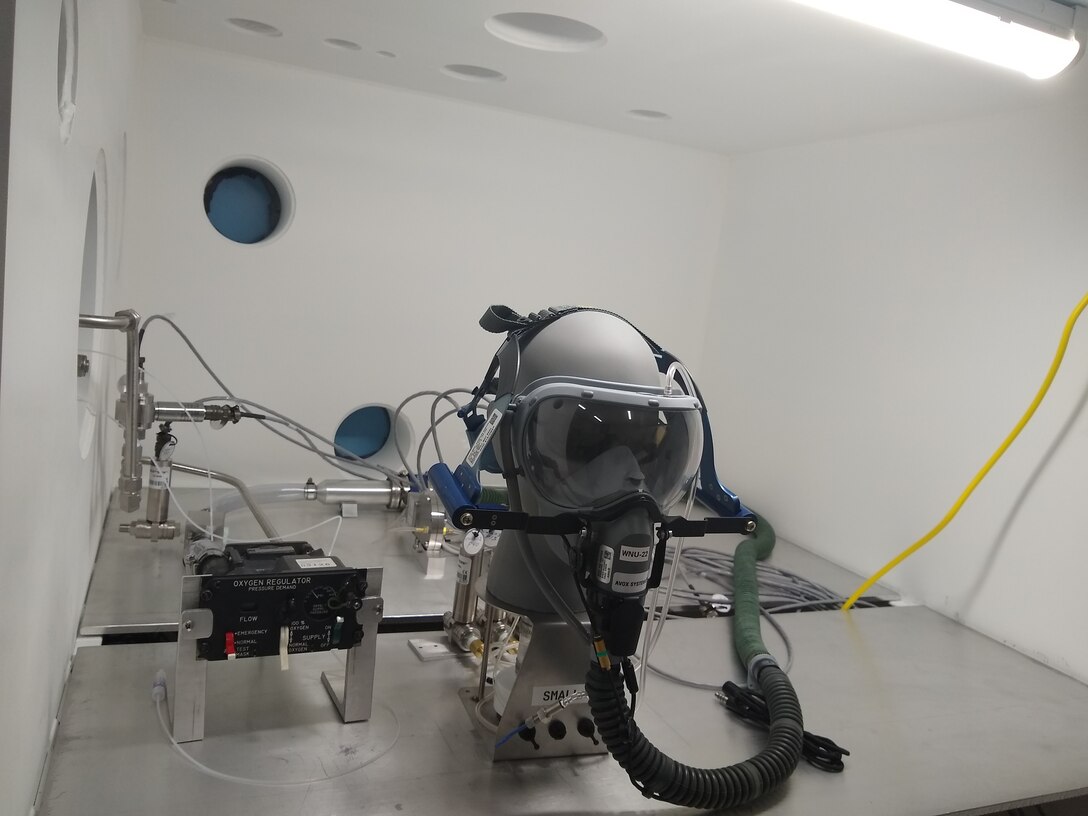 With the testing of this quick don mask in December 2020, the new Life Support Systems Scientific Test, Analysis, and Qualification Laboratory achieved initial operating capability. The Air Force Research Laboratory and the Air Force Life Cycle Management Center partnered to create this facility for the investigation of mission-critical in-flight oxygen issues. (U.S. Air Force photo)
