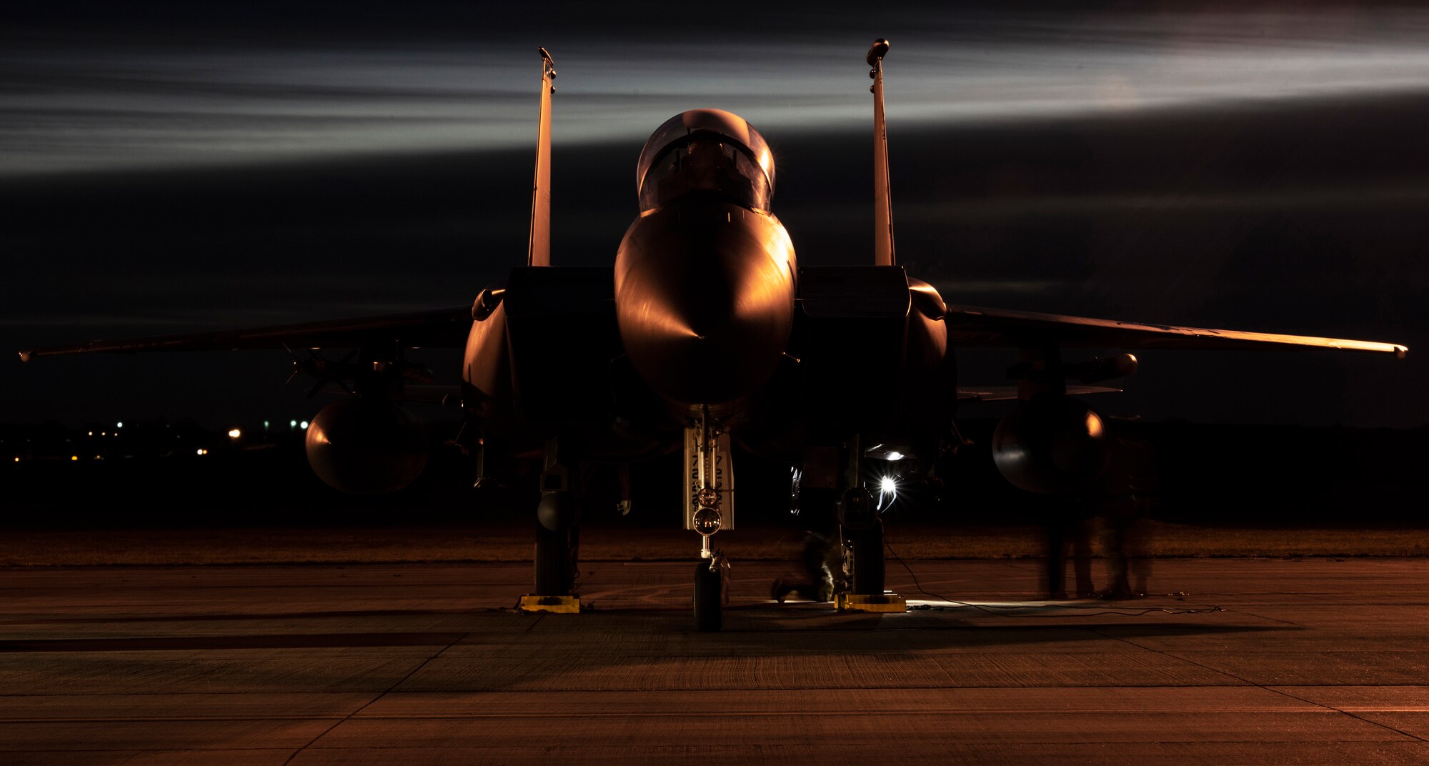 U.S. Air Force Airmen from the 48th Aircraft Maintenance Squadron perform pre-flight checks on an F-15E Strike Eagle during Agile Combat Employment training at Royal Air Force Lakenheath, England, Jan. 12, 2021. Exercising elements of ACE enables U.S. Air Forces in Europe to operate from locations with varying levels of capacity and support, ensuring Airmen and aircrews are postured to deliver lethal combat power across the spectrum of military operations. (U.S. Air Force photo by Airman 1st Class Jessi Monte)