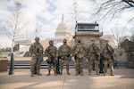 Virginia National Guard Airmen assigned to the 192nd Security Forces Squadron, 192nd Mission Support Group, 192nd Wing stand guard on the grounds of the U.S. Capitol, Jan. 13, 2021, in Washington, D.C.
