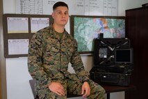 Cpl. Gilbert A. Barrett IV, a senior analyst and assistant intelligence chief with V 1/6, H&S company, 2d Marine Division, poses for a photo on Camp Lejeune , N.C., January, 2020. "If the shoe fits," said Barrett, a Wilbraham, Mass., native. According to his leadership, Barrett is a dedicated, motivated and highly proficient Marine and intelligence professional. Cpl Barrett is currently serving in a billet above his current pay grade and excels in all facets within his role and responsibilities. Cpl Barrett has a contagious winning attitude that spreads to his peers and subordinates. His ability to lead his peers while in this billet shows the immense levels of respect the Marines have for him due to his charismatic leadership stile. (U.S. Marine Corps photo by Pfc. Sarah L. Hediger)