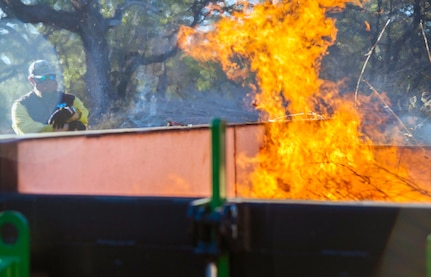 Work crews made up of members of the 802nd Civil Engineer Squadron, Joint Base San Antonio Natural Resources Office, Texas A&M Natural Resources Institute and the JBSA Wildland Support Module burned golden bamboo and cedar mulch