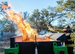 Work crews made up of members of the 802nd Civil Engineer Squadron, Joint Base San Antonio Natural Resources Office, Texas A&M Natural Resources Institute and the JBSA Wildland Support Module burned golden bamboo and cedar mulch