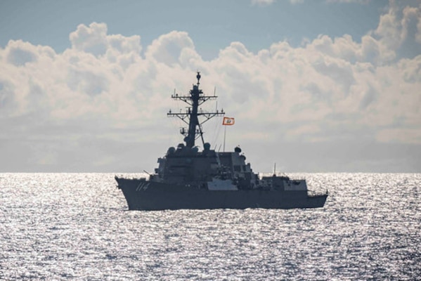 The Arleigh Burke-class guided-missile destroyer USS Ralph Johnson (DDG 114) sails towards the Arleigh Burke-class guided-missile destroyer USS John S. McCain (DDG 56) while conducting routine underway operations. McCain is assigned to Destroyer Squadron (DESRON) 15, the Navy’s largest forward-deployed DESRON and the U.S. 7th Fleet’s principal surface force.