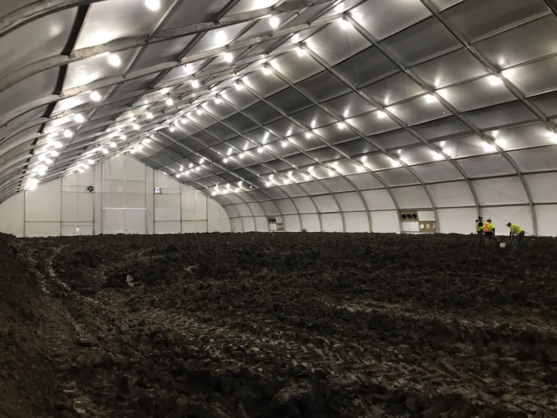 Eight heated tents to condition cohesive material so it can be placed along the levee setback alignment are being used on the L-536 levee system just south of Rock Port, Mo..