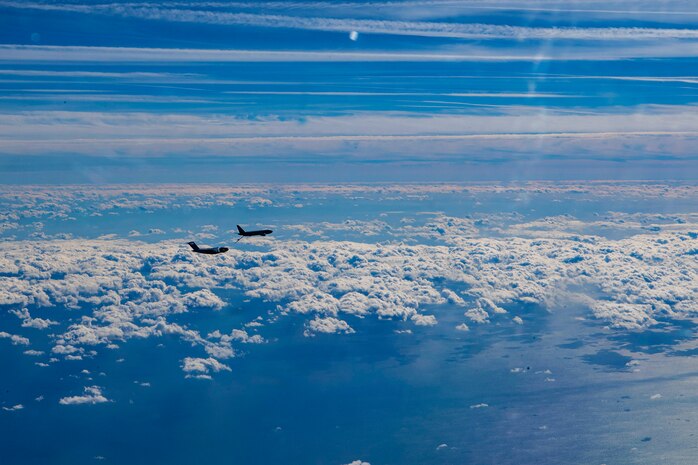 The KC-46 Pegasus refuels the legacy C-17 Globemaster III over the Atlantic Ocean to showcase the present and future of the Air Force, Jan. 15, 2021.