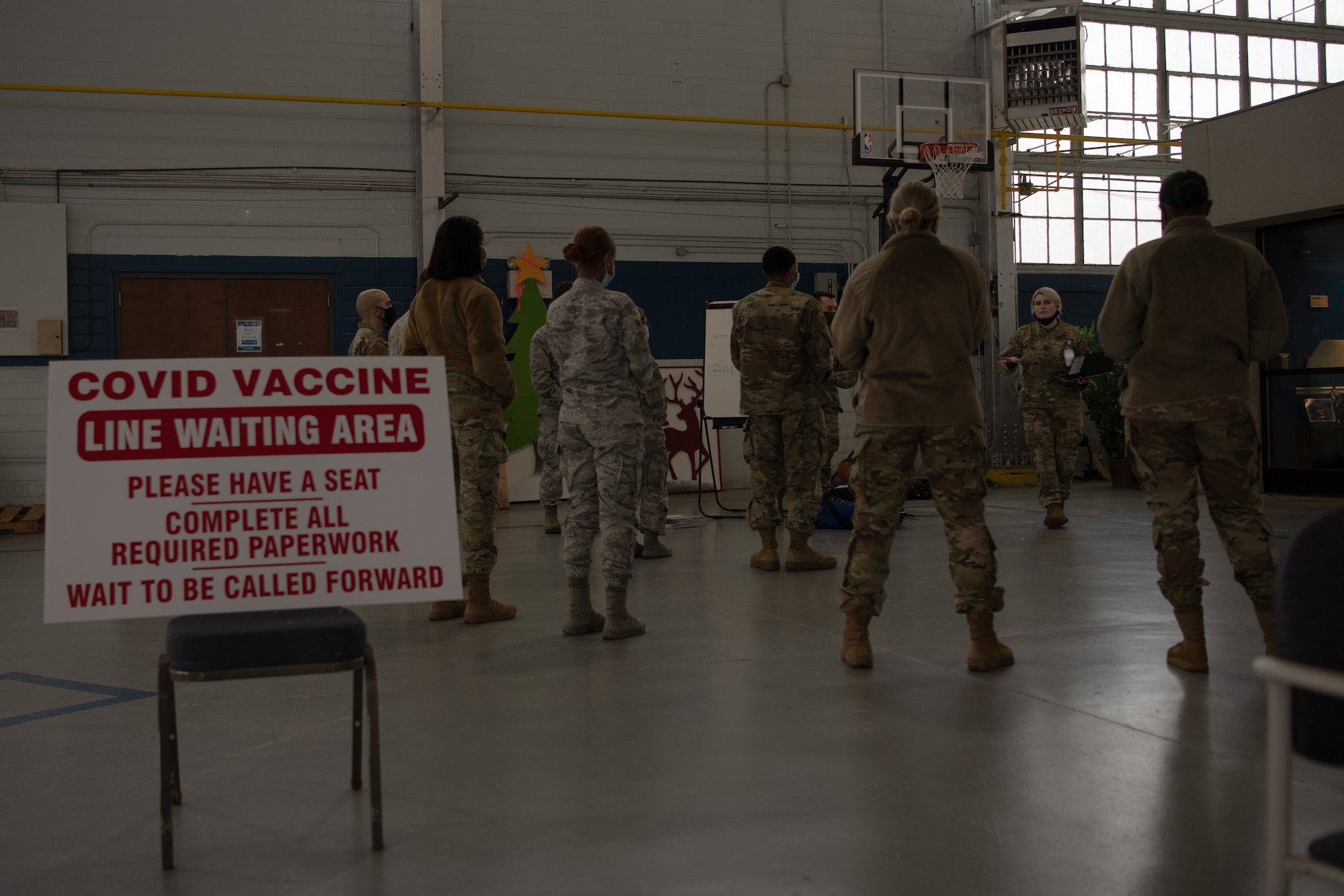 Capt. Aphton Lane, 42nd Medical Group Operation Warp Speed team lead, explains to a group of Airmen with the 42nd MDG how to recognize and respond if a patient experiences anaphylactic shock. “Our team is more than 100 percent ready to receive the vaccine and administer it as quickly and safely to our population here as possible.” said Lane.