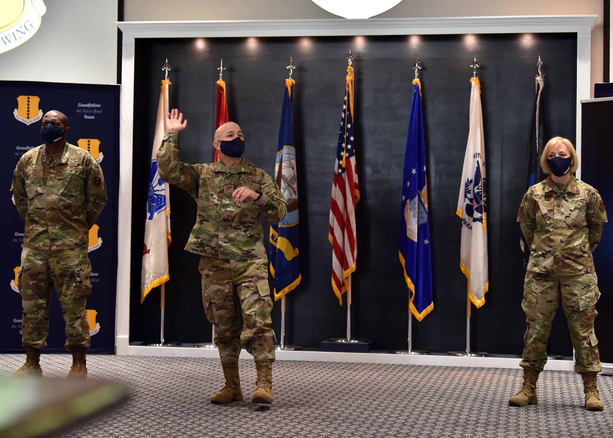 U.S. Air Force Col. Andres Nazario, 17th Training Wing commander, Col. James Finlayson, 17th TRW vice commander, and Chief Master Sgt. Casy Boomershine, 17th TRW command chief, introduce themselves at the first commander’s all call of 2021, at the Event Center on Goodfellow Air Force Base, Texas, Jan. 15, 2021. Nazario, Finlayson, and Boomershine introduced Goodfellow’s new focus Accelerate, Challenge, and Thrive, ACT. (U.S. Air Force photo by Staff Sgt. Seraiah Wolf)