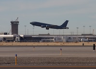 Utah Air National Guard KC-135 takes off from runway.