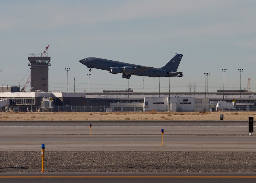 Utah Air National Guard KC-135 takes off from runway.