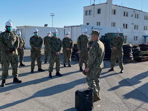 ROTA, Spain (Jan. 15, 2021) - Chief of Naval Operations (CNO) Adm. Mike Gilday and Master Chief Petty Officer of the Navy (MCPON) Russ Smith address the crews of the Arleigh Burke-class guided-missile destroyers USS Roosevelt (DDG 80) and USS Ross (DDG 71) pier side. Gilday and Smith are visiting Rota to highlight the importance of warfighting and readiness to Sailors in the region. (U.S. Navy photo by Cmdr. Nate Christensen/Released)