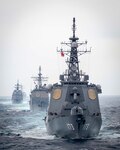 PACIFIC OCEAN (Jan. 15, 2021) – The Japan Maritime Self-Defense Force (JMSDF) Kongo-class guided-missile destroyer JS Kongo (DDG 173), front, Ticonderoga-class guided-missile cruiser USS Bunker Hill (CG 52), JMSDF Asahi-class destroyer JS Asahi (DD 119), and the Arleigh Burke-class guided-missile destroyer USS John Finn (DDG 113) transit the Pacific Ocean Jan. 15, 2021. The Theodore Roosevelt Carrier Strike Group is on a scheduled deployment to the U.S. 7th Fleet area of operations. As the U.S. Navy's largest forward deployed fleet, with its approximate 50-70 ships and submarines, 140 aircraft, and 20,000 Sailors in the area of operations at any given time, 7th Fleet conducts forward-deployed naval operations in support of U.S. national interests throughout a free and open Indo-Pacific area of operations to foster maritime security, promote stability, and prevent conflict alongside 35 other maritime nations and partners. (U.S. Navy photo by Mass Communication Specialist 3rd Class Dartañon D. De La Garza)