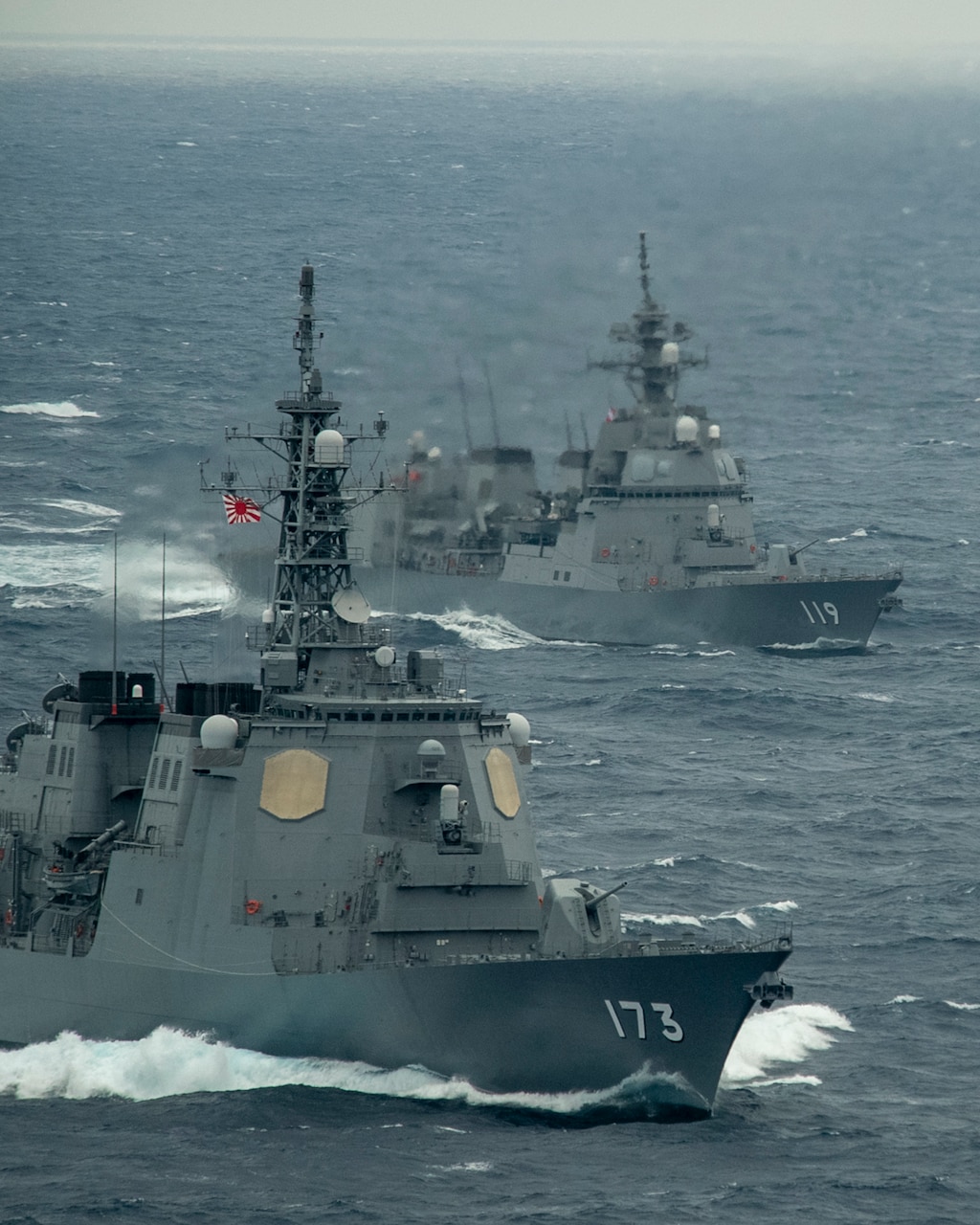 PACIFIC OCEAN (Jan. 15, 2021) – The Japan Maritime Self-Defense Force Kongo-class guided-missile destroyer JS Kongo (DDG 173), front, and Asahi-class destroyer JS Asahi (DD 119) transit the Pacific Ocean Jan. 15, 2021 with the Theodore Roosevelt Carrier Strike Group. The Theodore Roosevelt Carrier Strike Group is on a scheduled deployment to the U.S. 7th Fleet area of operations. As the U.S. Navy's largest forward deployed fleet, with its approximate 50-70 ships and submarines, 140 aircraft, and 20,000 Sailors in the area of operations at any given time, 7th Fleet conducts forward-deployed naval operations in support of U.S. national interests throughout a free and open Indo-Pacific area of operations to foster maritime security, promote stability, and prevent conflict alongside 35 other maritime nations and partners. (U.S. Navy photo by Mass Communication Specialist 2nd Class Casey Scoular)