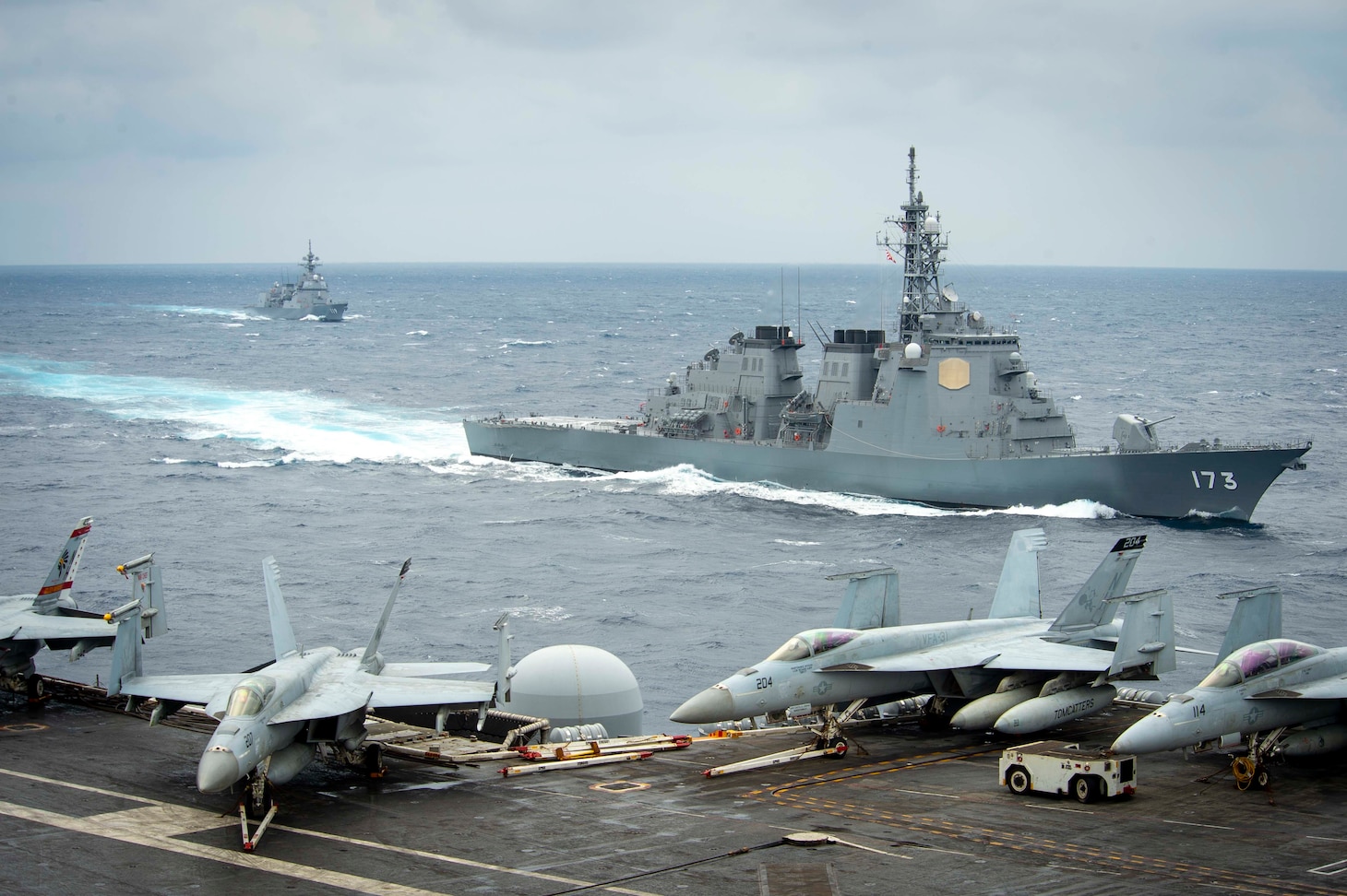 PACIFIC OCEAN (Jan. 15, 2021) – The Japan Maritime Self-Defense Force (JMSDF) Kongo-class guided-missile destroyer JS Kongo (DDG 173), front, and JMSDF Asahi-class destroyer JS Asahi (DD 119) transit the Pacific Ocean Jan. 15, 2021 with the Theodore Roosevelt Carrier Strike Group. The Theodore Roosevelt Carrier Strike Group is on a scheduled deployment to the U.S. 7th Fleet area of operations. As the U.S. Navy's largest forward deployed fleet, with its approximate 50-70 ships and submarines, 140 aircraft, and 20,000 Sailors in the area of operations at any given time, 7th Fleet conducts forward-deployed naval operations in support of U.S. national interests throughout a free and open Indo-Pacific area of operations to foster maritime security, promote stability, and prevent conflict alongside 35 other maritime nations and partners. (U.S. Navy photo by Mass Communication Specialist 3rd Class Dartañon D. De La Garza)