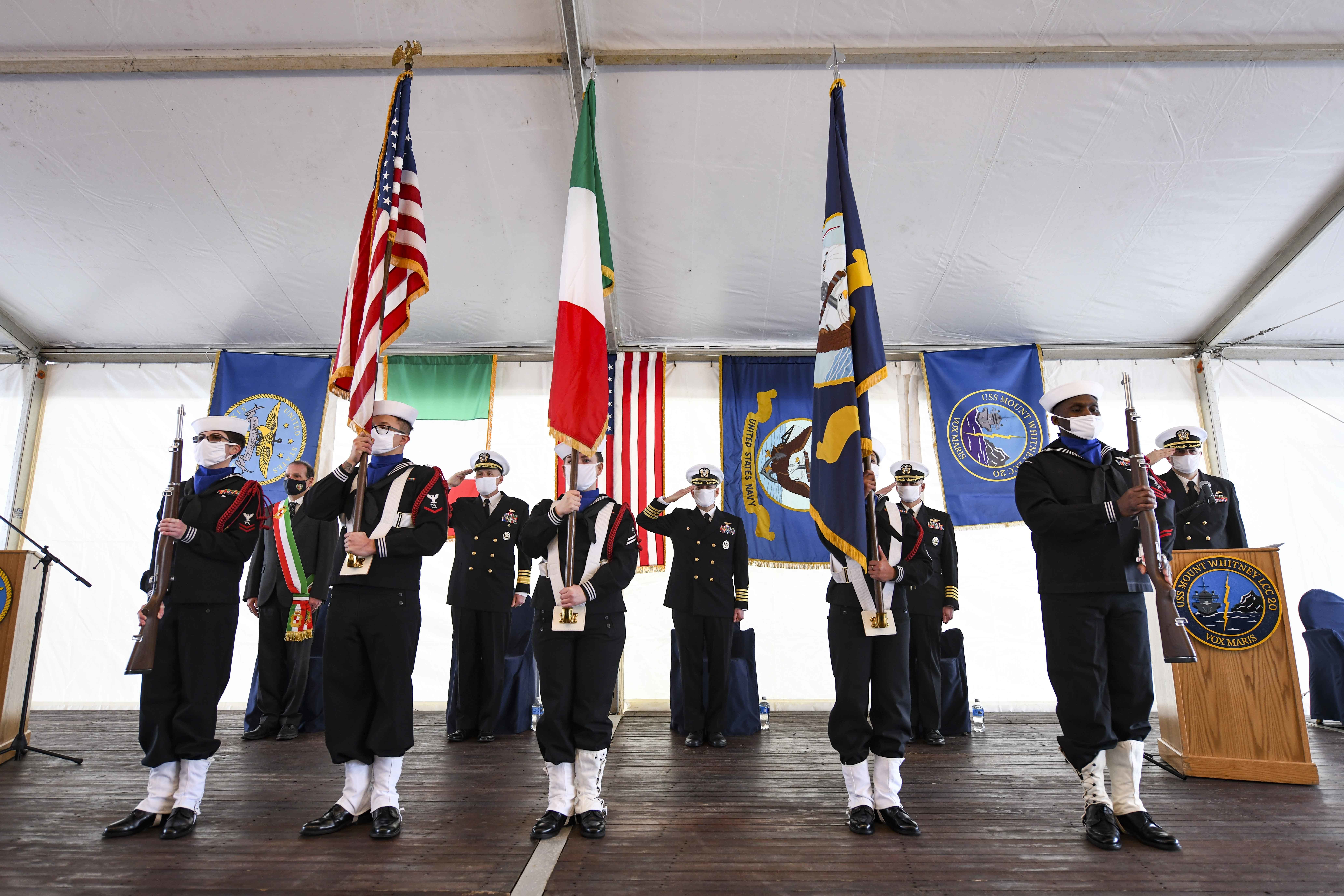 The U.S. 6th Fleet command and control ship USS Mount Whitney (LCC 20) honor guard parades the colors during the ship's 50th anniversary celebration, Jan. 14, 2021, in Gaeta, Italy.