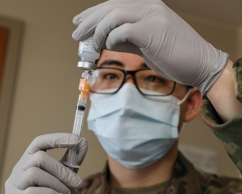 Marines with Marine Corps Forces Korea begin receiving
Moderna COVID-19 vaccine at Brian D. Allgood Army Community Hospital, on Camp Humphreys, South Korea, January 13, 2021 (U.S. Marine Corps/Ashley McLaughlin)