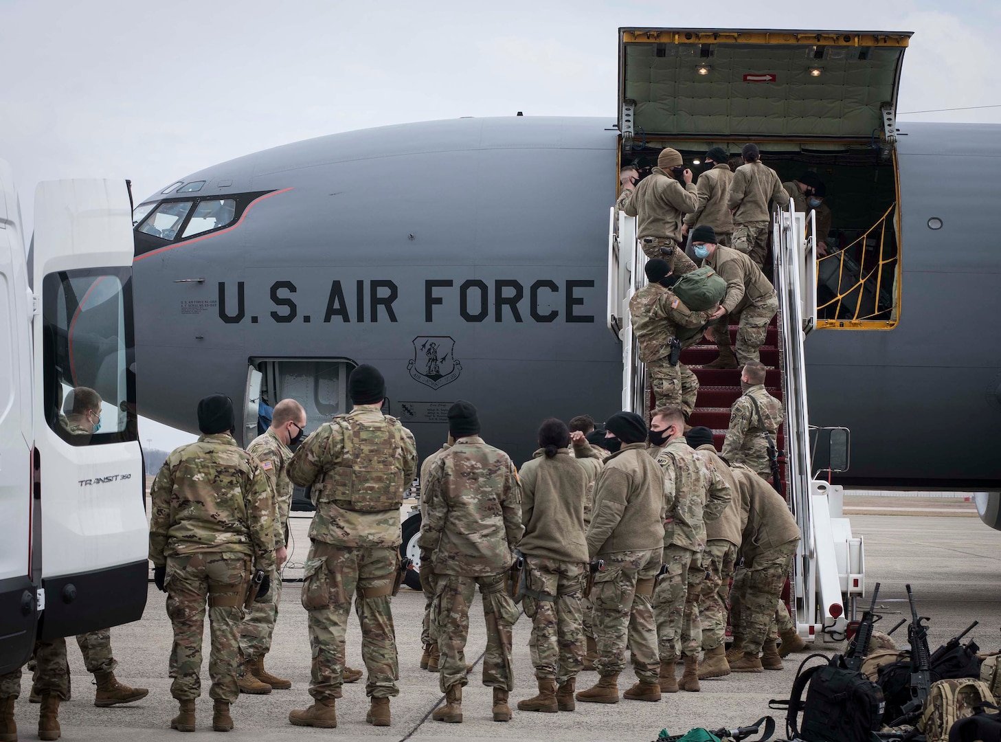 Members of the Tennessee National Guard offload equipment from a KC-135 Stratotanker, assigned to the 134th Air Refueling Wing, Tennessee Air National Guard, upon arrival to Joint Base Andrews, Md., Jan. 15, 2021. National Guard Soldiers and Airmen from several states have traveled to Washington, D.C., to support federal and D.C. authorities leading up to the 59th presidential inauguration.
