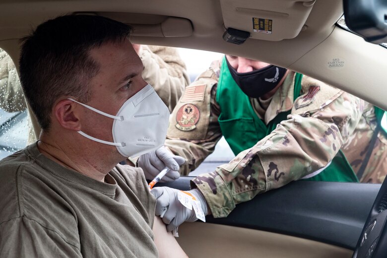 Airman receiving a vaccine.