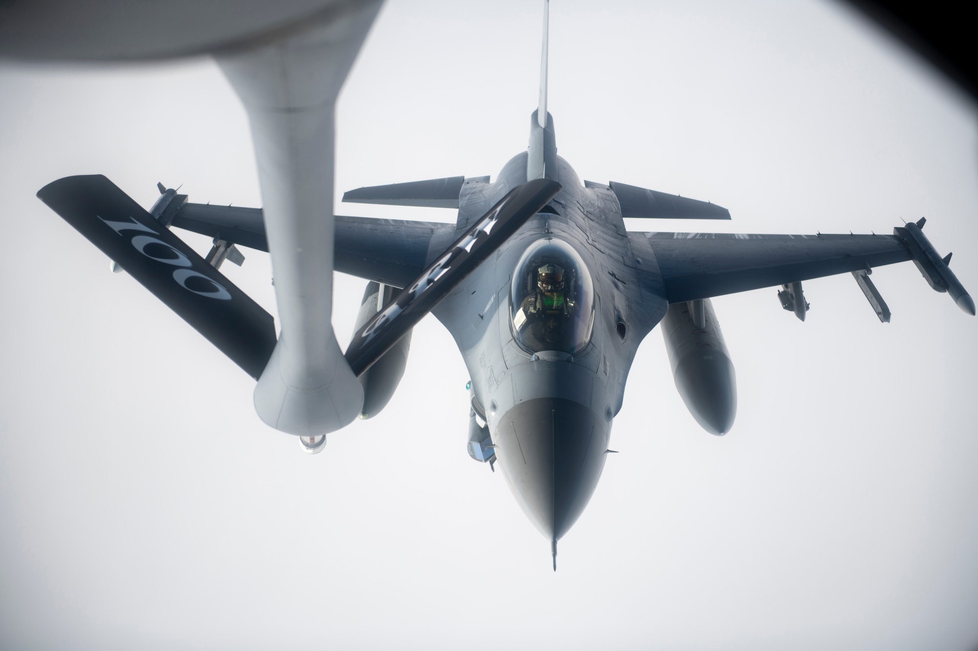 A U.S. Air Force F-16 Fighting Falcon assigned to the 555th Fighter Squadron, Aviano Air Base, Italy, approaches a KC-135 Stratotanker assigned to the 100th Air Refueling Wing, RAF Mildenhall, United Kingdom, before receiving fuel during a mission over the Black Sea, Jan. 14, 2021. U.S. military operations in the Black Sea enhance regional stability, combined readiness and capability with our NATO allies and partners.