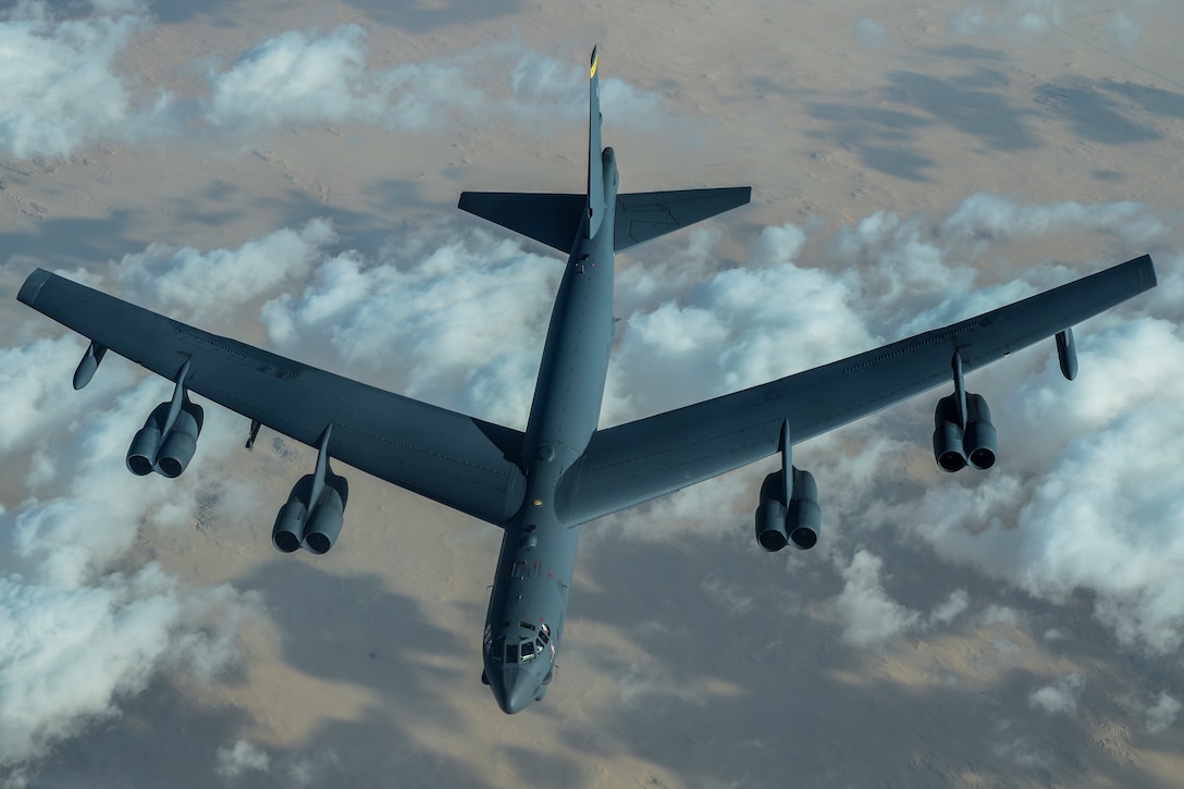 A U.S. Air Force B-52 Stratofortress assigned to the 5th Bomb Wing departs after receiving fuel from a KC-10 Extender assigned to the 908th Expeditionary Air Refueling Squadron during a Bomber Task Force (BTF) mission over the U.S. Central Command area of responsibility, Jan. 17, 2021. BTF missions or deployments showcase the U.S. Air Force’s ability to rapidly and effectively support missions around the globe and seamlessly integrate into operations. (U.S. Air Force photo by Senior Airman Aaron Larue Guerrisky)