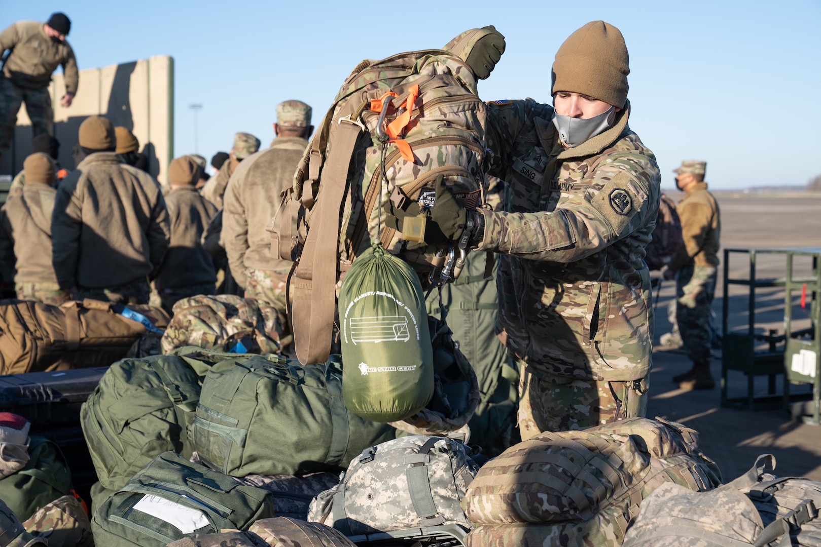 Louisiana National Guard Soldiers and Airmen from throughout the state prep their gear and board planes at Alexandria Airport in Alexandria, Louisiana, en route to Washington, D.C., Jan. 16, 2021. They will assist the District of Columbia National Guard to ensure a safe presidential inauguration.