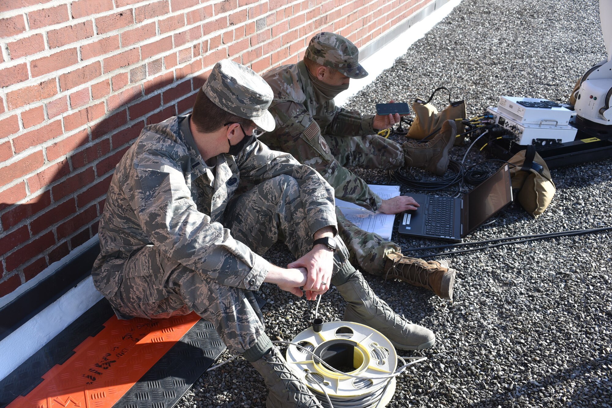 Members of the 111th Attack Wing Communications Squadron and the 271st Combat Communications Squadron, Horsham Air Guard Station, Pa., begin the procedure of setting up satellite communications at the District of Colombia National Guard’s Joint Force Headquarters in Washington, D.C., on Jan. 10, 2021, while supporting Operation Capitol Response-PA.
