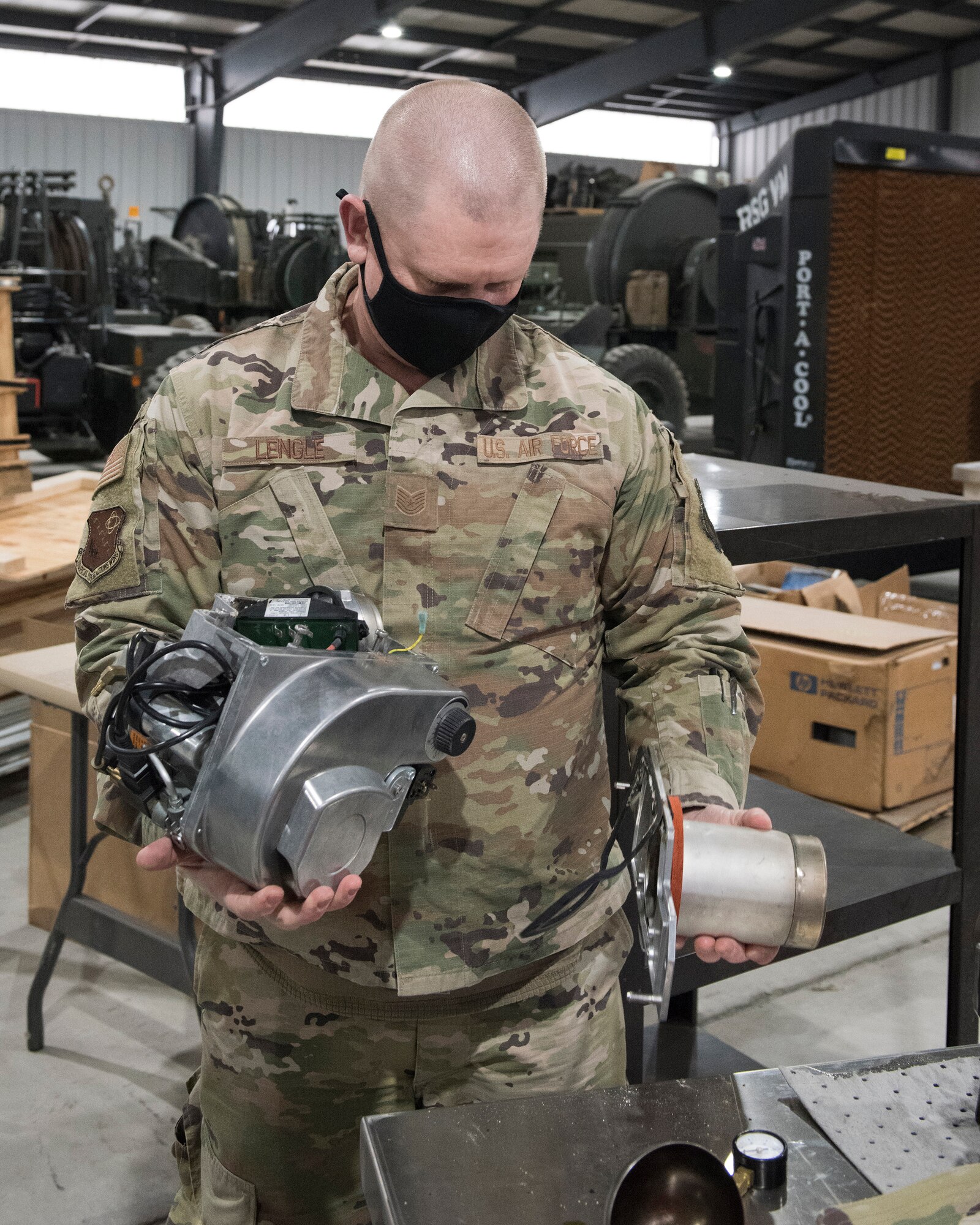 Tech. Sgt. Michael Lengle preps a burner to load onto a truck while preparing to deploy to the Capitol region in support of service members in the D.C. area for the 59th Presidential Inauguration