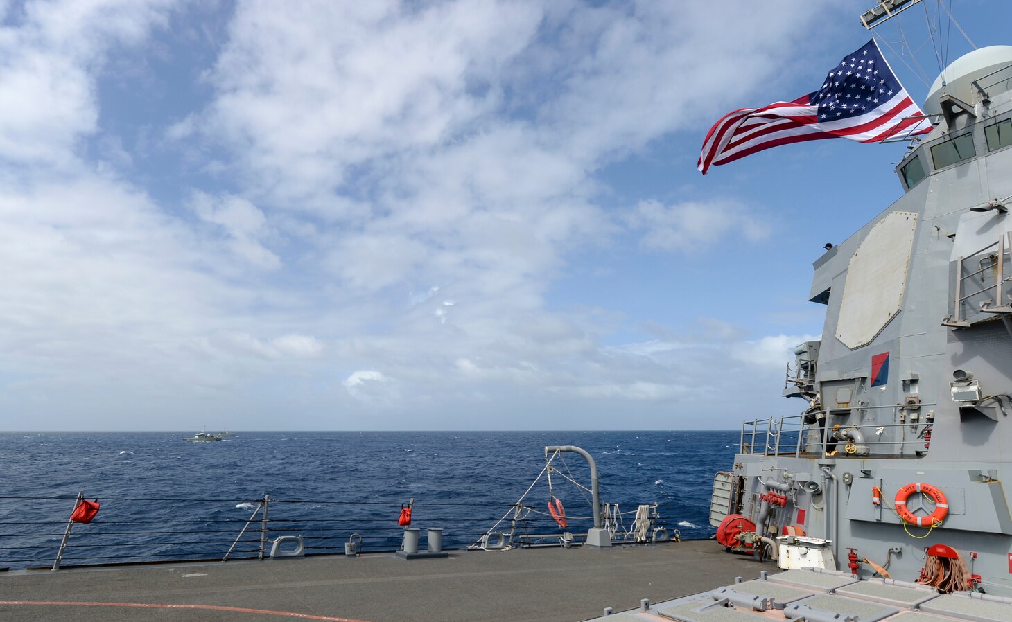 PACIFIC OCEAN (Jan. 9, 2021) The Federated States of Micronesia (FSM) National Police Maritime Surveillance Division Patrol Boats FSS Palikir and FSS Micronesia transit alongside the Arleigh Burke-class guided-missile destroyer USS Russell (DDG 59) Jan. 9, 2021. Russell, part of the Theodore Roosevelt Carrier Strike Group, is on a scheduled deployment to the U.S. 7th Fleet area of operations. As the U.S. Navy’s largest forward deployed fleet, with its approximate 50-70 ships and submarines, 140 aircraft, and 20,000 Sailors in the area of operations at any given time, 7th Fleet conducts forward-deployed naval operations in support of U.S. national interests throughout a free and open Indo-Pacific area of operations to foster maritime security, promote stability, and prevent conflict alongside 35 other maritime nations and partners. (U.S. Navy photo by Mass Communication Specialist 3rd Class Wade Costin)