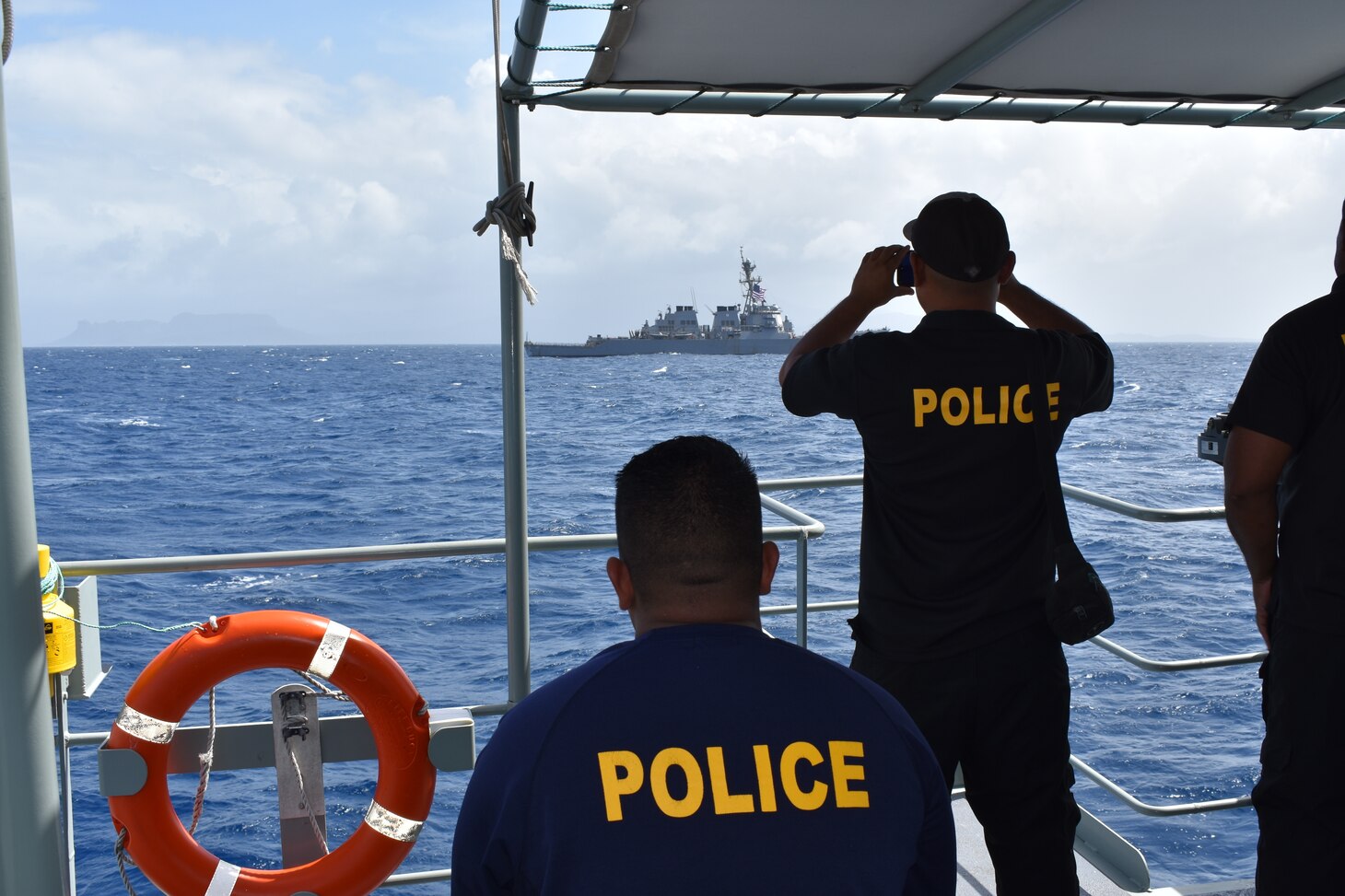 PACIFIC OCEAN (Jan. 9, 2020) – The Arleigh Burke-class guided-missile destroyer USS Russell (DDG 59) conducts a cooperative deployment with the Federated States of Micronesia (FSM) National Police Maritime Surveillance Division Patrol Boats FSS Palikir and FSS Micronesia in Pohnpei State, FSM, reinforcing US commitment to the safety and security of the Federated States of Micronesia. Russell, part of the Theodore Roosevelt Carrier Strike Group, is on a scheduled deployment to the 7th Fleet area of operations. As the U.S. Navy's largest forward deployed fleet, with its approximate 50-70 ships and submarines, 140 aircraft, and 20,000 Sailors in the area of operations at any given time, 7th Fleet conducts forward-deployed naval operations in support of U.S. national interests throughout a free and open Indo-Pacific area of operations to foster maritime security, promote stability, and prevent conflict alongside 35 other maritime nations and partners. (Courtesy photo by U.S. Defense Attache Office, Kolonia, FSM)