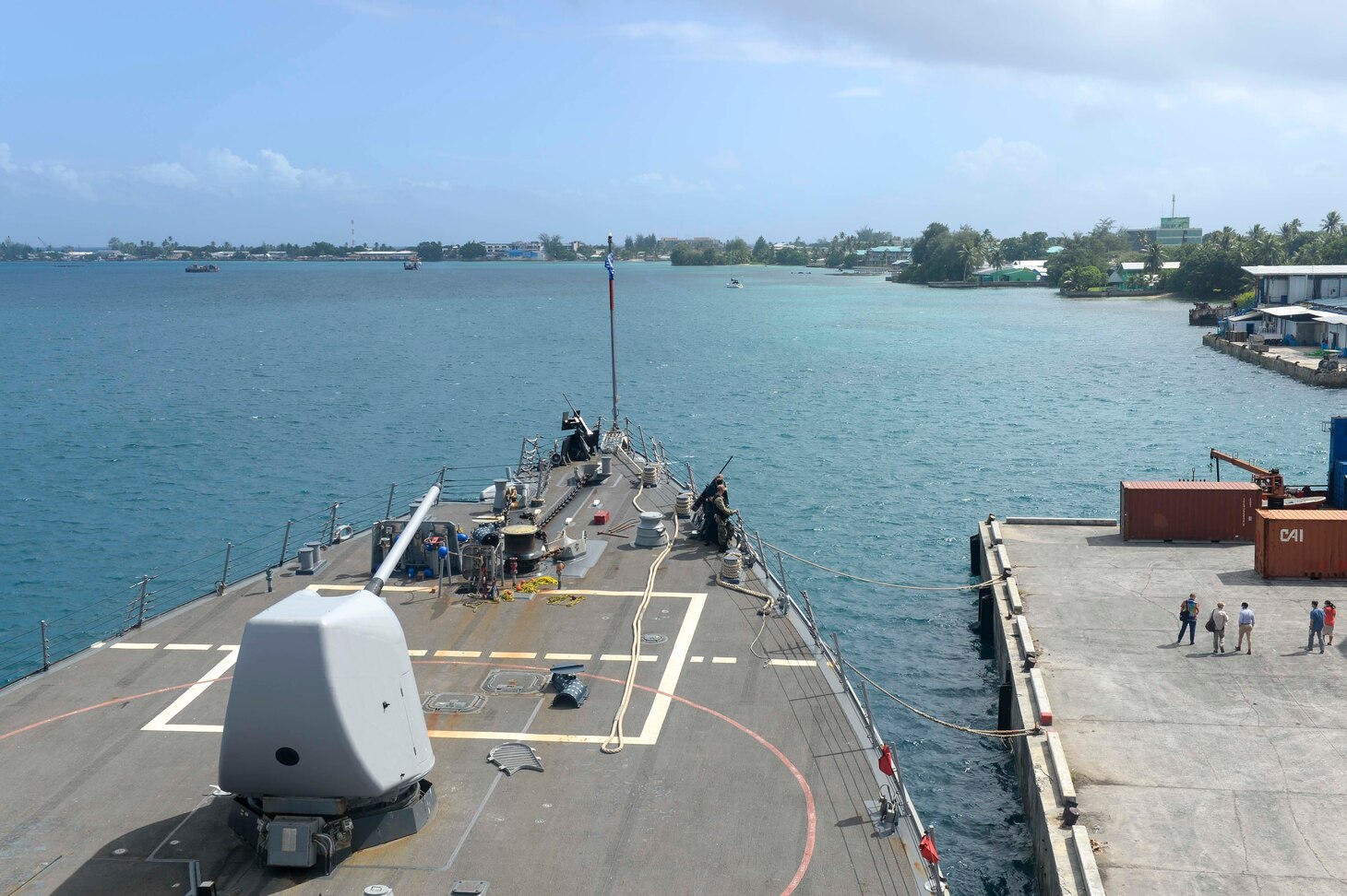 MAJURO, Marshall Islands (Jan. 7, 2021) The Arleigh Burke-class guided-missile destroyer USS Russell (DDG 59) is moored to the pier in Majuro, Marshall Islands, Jan. 7, 2021. Russell, part of the Theodore Roosevelt Carrier Strike Group, is on a scheduled deployment to the U.S. 7th Fleet area of operations. As the U.S. Navy’s largest forward deployed fleet, with its approximate 50-70 ships and submarines, 140 aircraft, and 20,000 Sailors in the area of operations at any given time, 7th Fleet conducts forward-deployed naval operations in support of U.S. national interests throughout a free and open Indo-Pacific area of operations to foster maritime security, promote stability, and prevent conflict alongside 35 other maritime nations and partners. (U.S. Navy photo by Mass Communication Specialist 3rd Class Wade Costin)