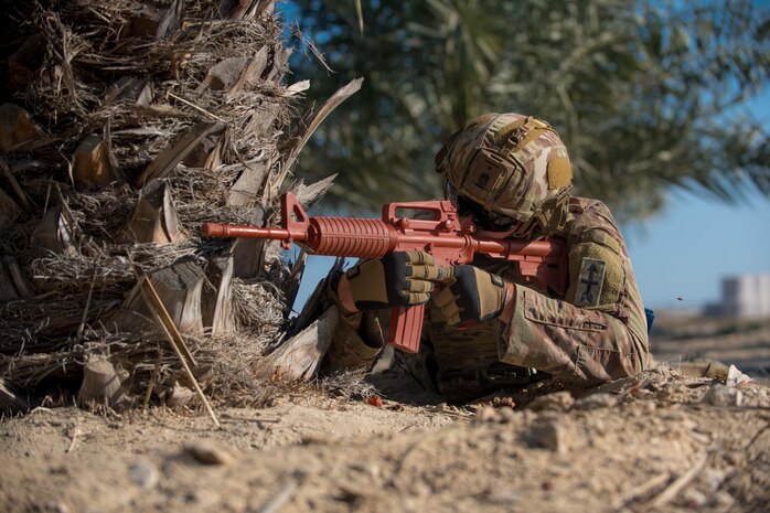 210113-N-KZ419-1157 U.S. 5TH FLEET AREA OF OPERATIONS (Jan. 13, 2021) A U.S. Soldier assigned to U.S. Naval Forces Central Command holds a security position during a joint anti-terrorism exercise with the Bahrain Defense Force in the U.S. 5th Fleet area of operations, Jan. 13. The bilateral exercise focused on enhancing mutual security and anti-terrorism capabilities by testing responses to simulated scenarios. (U.S. Navy photo by Mass Communication Specialist 3rd Class Dawson Roth)