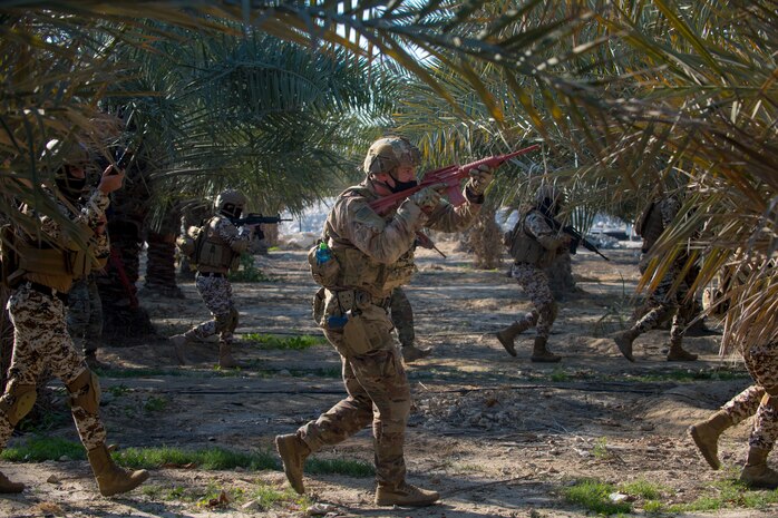 210113-N-KZ419-1275 U.S. 5TH FLEET AREA OF OPERATIONS (Jan. 13, 2021) Bahrain Defense Force and U.S. Naval Forces Central Command personnel secure a perimeter during a joint anti-terrorism exercise in the U.S. 5th Fleet area of operations, Jan. 13. The bilateral exercise focused on enhancing mutual security and anti-terrorism capabilities by testing responses to simulated scenarios. (U.S. Navy photo by Mass Communication Specialist 3rd Class Dawson Roth)