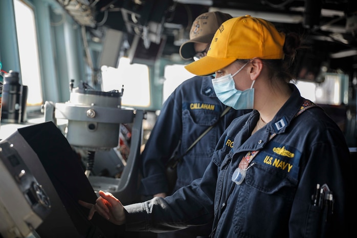 210115-N-BM428-0260 ATLANTIC OCEAN (Jan. 15, 2021) Lt. Mikaela Robbins determines the course of the Arleigh Burke-class guided-missile destroyer USS Porter (DDG 78) with Lt. j.g. Brian Callahan on the bridge of the ship during Exercise Atlas Handshake while in the Atlantic Ocean, Jan. 15, 2021. Porter, forward deployed to Rota, Spain, is on its ninth patrol in the U.S. 6th fleet area of operations in support of U.S. national security interests in Europe and Africa. (U.S. Navy photo by Mass Communication Specialist 2nd Class Damon Grosvenor)